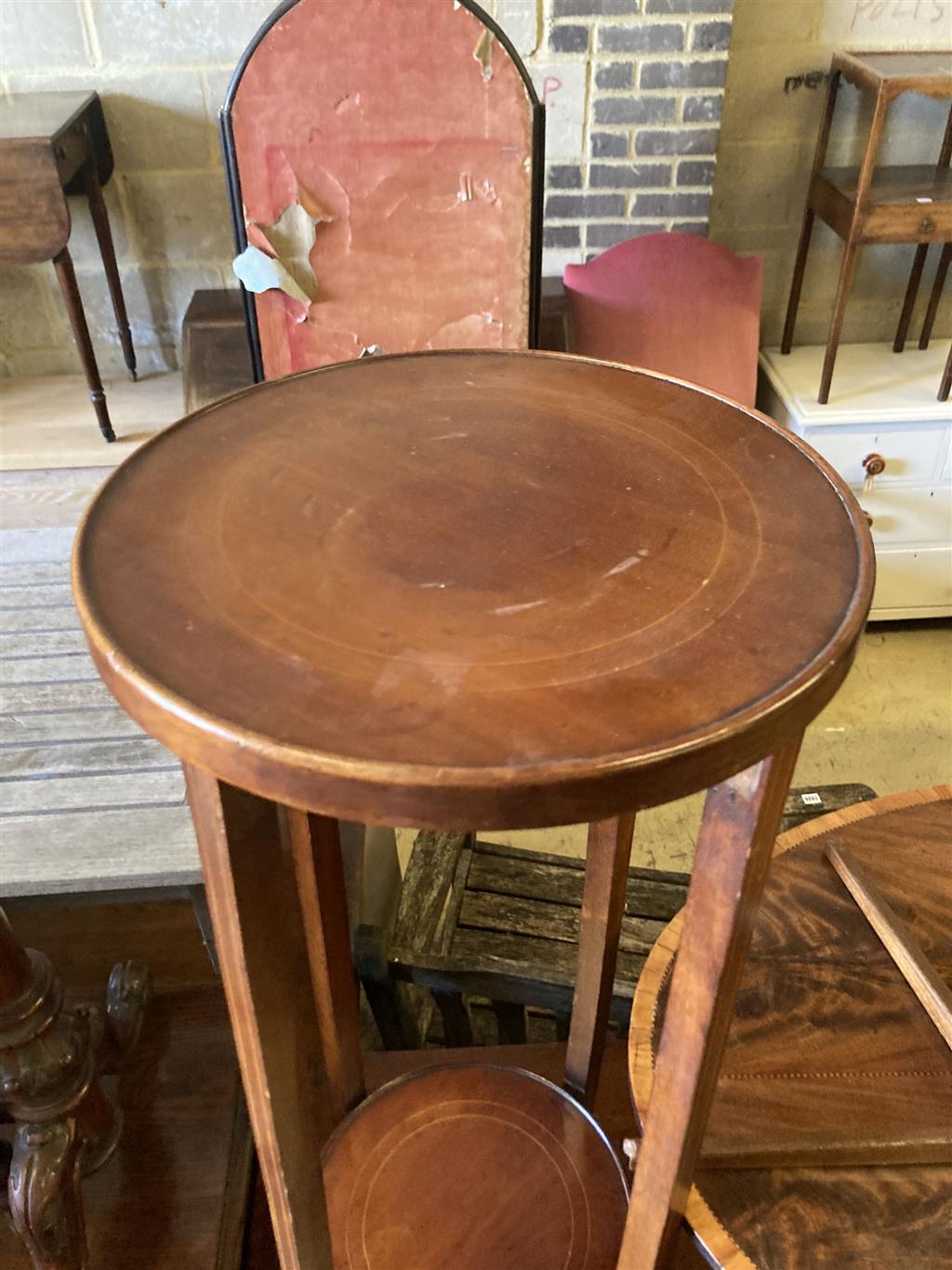 An oval marquetry inlaid mahogany occasional table, width 75cm, depth 52cm, height 50cm, together with an Edwardian two tier plant stan